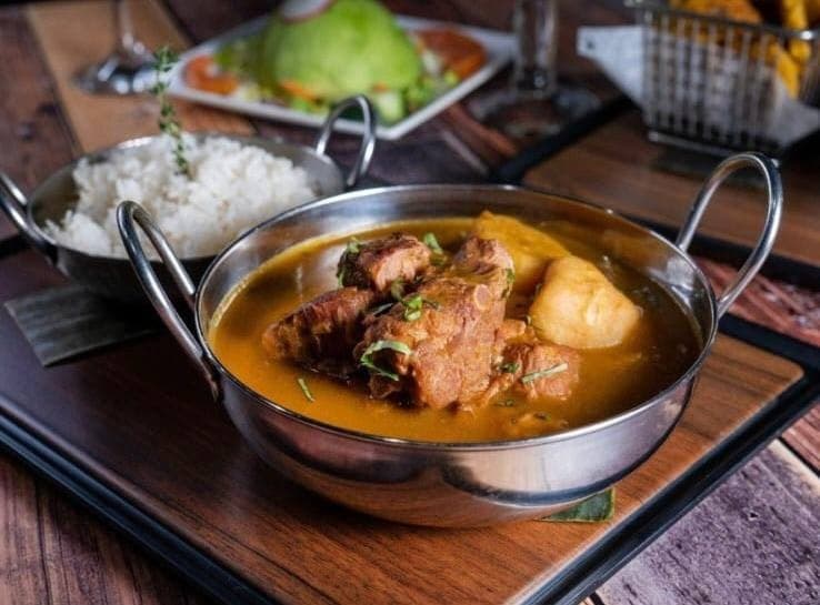 Dominican beef stew with rice — sancocho-style home cooking