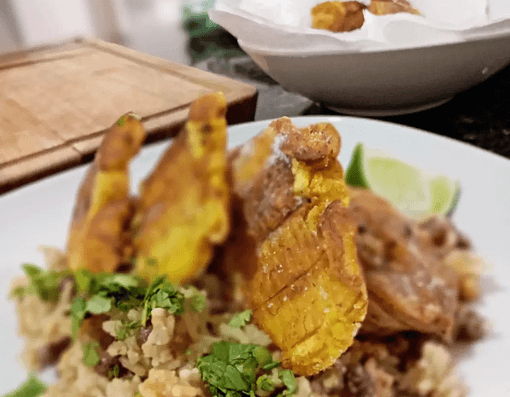 Rice with beans and crispy fried plantains