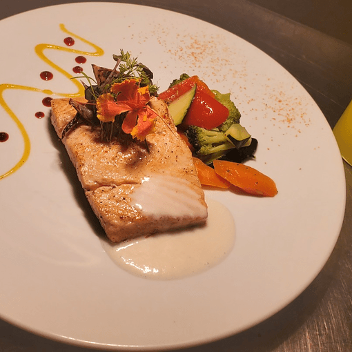 Seared fish with seasonal vegetables and dill